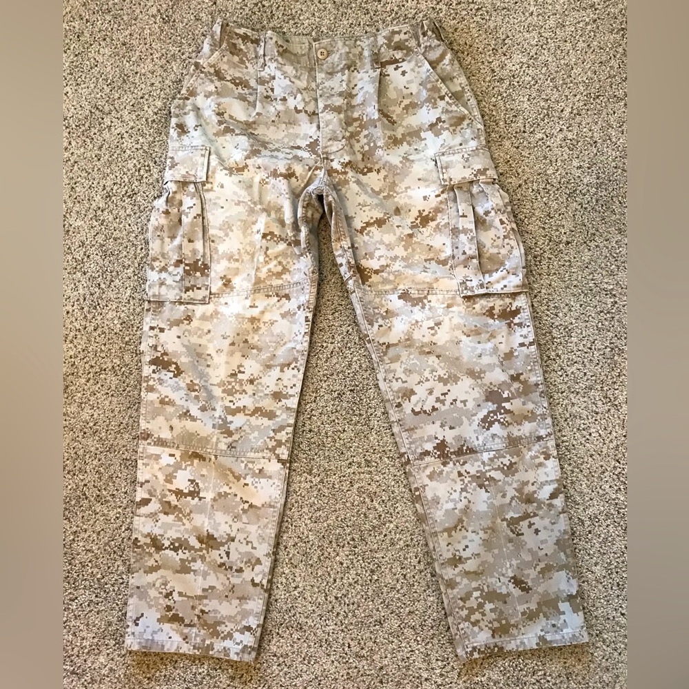 Camouflage tactical pants. In Great Condition!  Waist 31” Inseam 32”. Tan/Beige